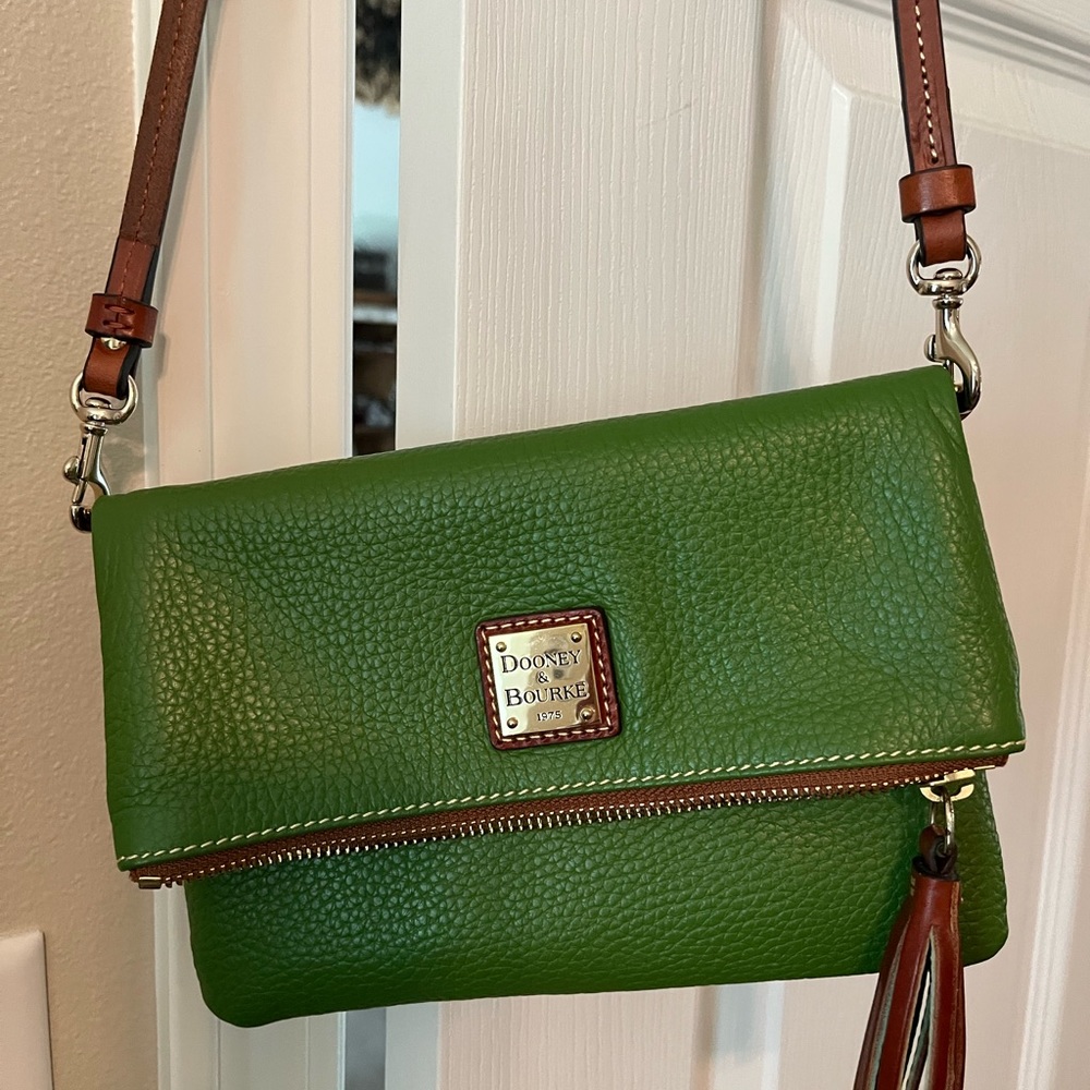 Beautiful spring green Dooney and Bourque crossbody bag.